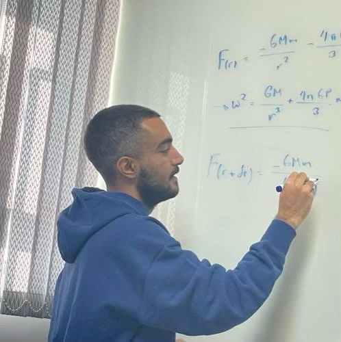 Students solving Olympiad problems in class